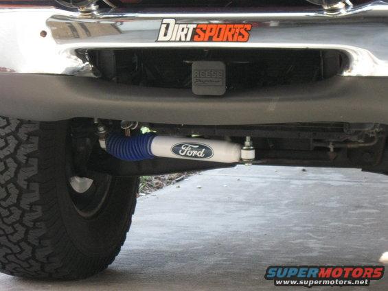Ford shock absorber with blue boot and chrome body