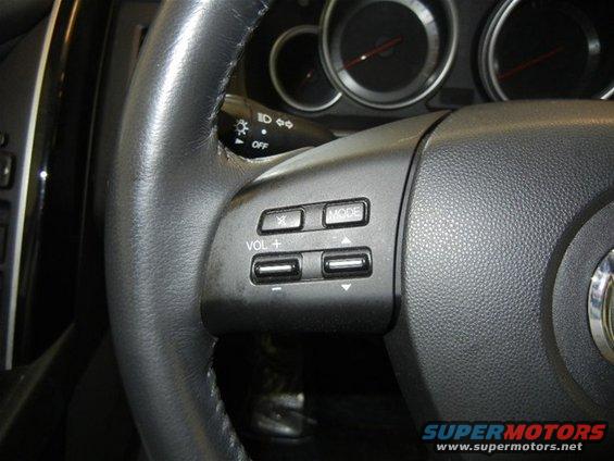 2008 Mazda CX-9 steering wheel with mode and volume controls
