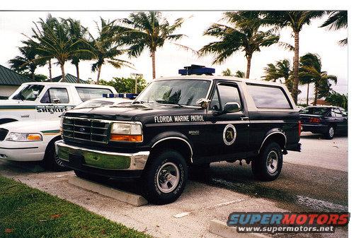 Black 1994 Ford Bronco with Florida Marine Patrol markings, 3/4 front view