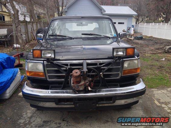 1995 Ford Bronco front view with plow mount attached to bumper