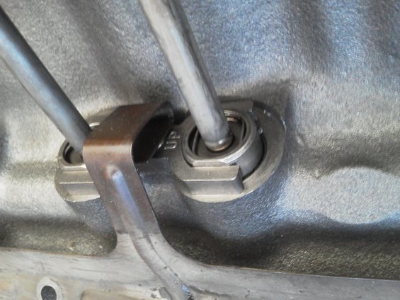 Close-up of engine valve train with pushrods and rocker arm assembly