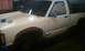 1991 Chevrolet S10 - This 1991 Chevrolet S10 pickup truck is undergoing preparation for a paint job, with masking tape applied to the driver's side door and fen…