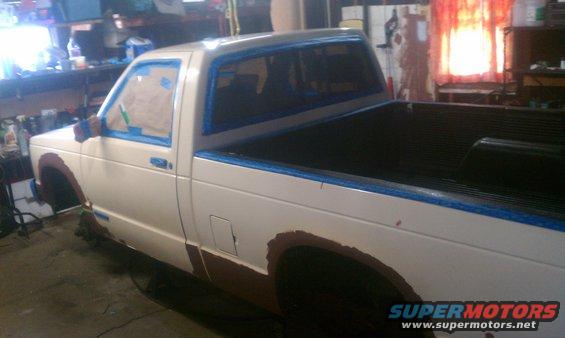 White 1991 Chevrolet S10 pickup truck, 3q-front view, being prepped for paint