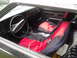 1975 Chevrolet Chevelle - Interior view of a 1975 Chevrolet Chevelle, custom red and black seat covers.