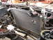 1992 Ford Taurus - Radiator installation in progress, showing the new part fitted into the engine compartment.
