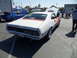 1973 Ford Ranchero - Rear view of a 1970 Ford Ranchero at a car show, with another blue car in the background.