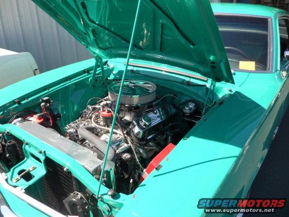 Teal 1973 Ford Ranchero engine bay with chrome air cleaner and V8 engine