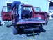 1978 Ford Bronco - Person working on the rear of a red 1978 Ford Bronco with the bed disassembled.