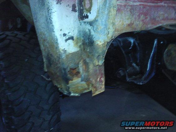 Rusted wheel well and suspension of a vehicle
