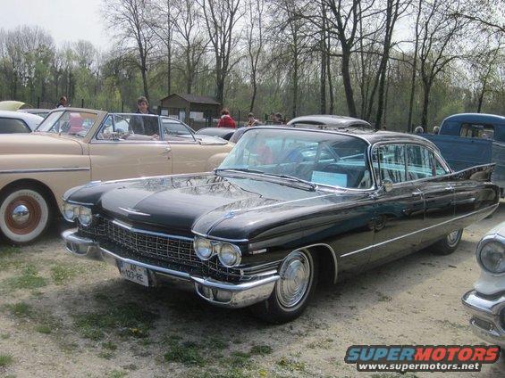 Black 1959 Cadillac Sedan de Ville front 3/4 view
