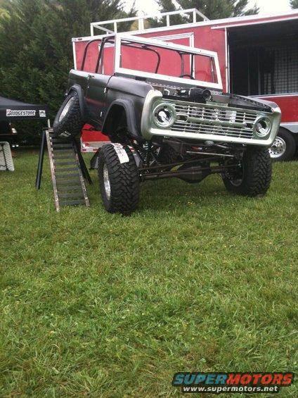 Black lifted Ford Bronco, front view, custom grille