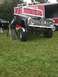1992 Ford Bronco - This heavily modified Ford Bronco features a distinctive custom grille and lifted suspension.