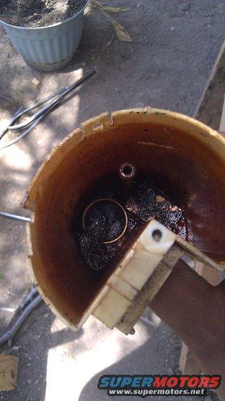 dirty fuel pump assembly with debris inside