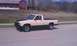 1991 Chevrolet S10 - Side view of a 1991 Chevrolet S10 pickup truck parked on a street.
