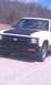 1991 Chevrolet S10 - A white 1991 Chevrolet S10 pickup truck is seen from the front-right angle, parked outdoors.