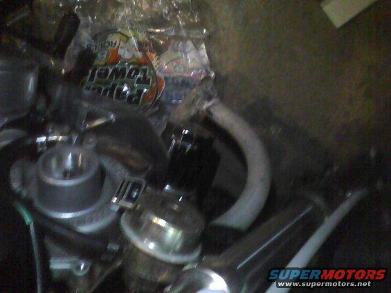 Engine parts with a roll of paper towels