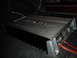 2000 Mercury Grand Marquis - A car amplifier with visible wiring and a brand logo is shown.