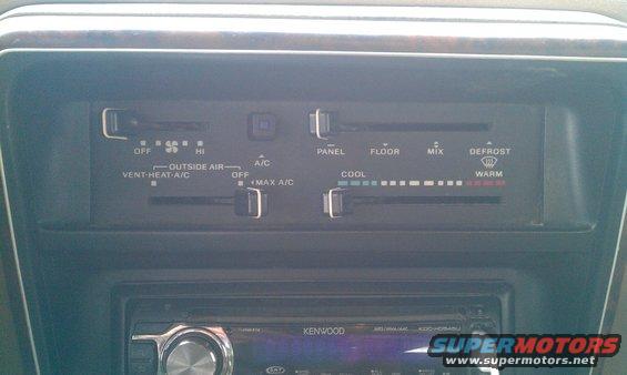 Dashboard climate controls with fan speed, temperature, and vent settings
