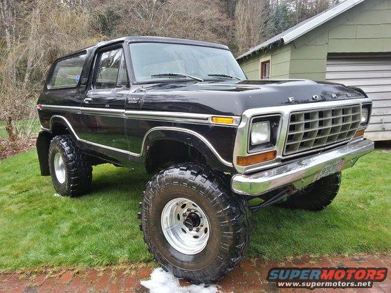 Black 1979 Ford Bronco lifted with large tires