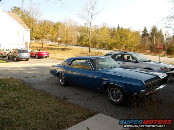 Blue 1968 Mercury Cougar 3q-front view parked next to other vehicles