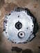 2004 Ford Crown Victoria - This is a close-up view of a transmission component, likely a housing or adapter plate.
