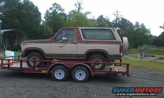 Side view of a 1980 Ford Bronco on a trailer