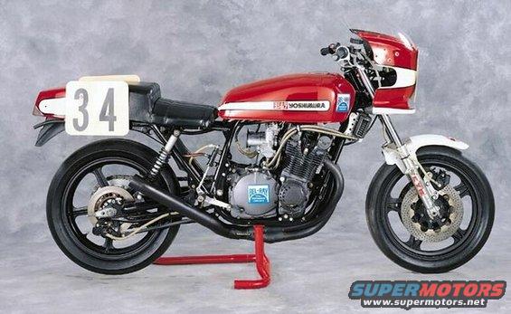 Red Yoshimura motorcycle with number 34 on the rear fender, on a red stand