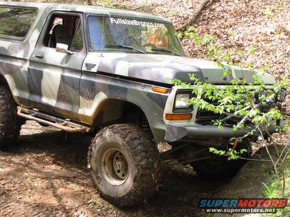 1979 Ford Bronco in camouflage, 3q-front view, off-roading