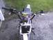 2003 Ford Crown Victoria - Overhead view of dirt bike handlebars and front section, showing controls and front plate.