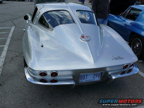 1963 Chevrolet Corvette Sting Ray rear with split window coupe body, quad taillights, and license plate 007 298