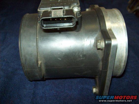 Mass air flow sensor with electrical connector visible