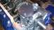 1973 Ford Torino - The oil pump assembly is bolted onto the engine block, with a timing chain nearby.