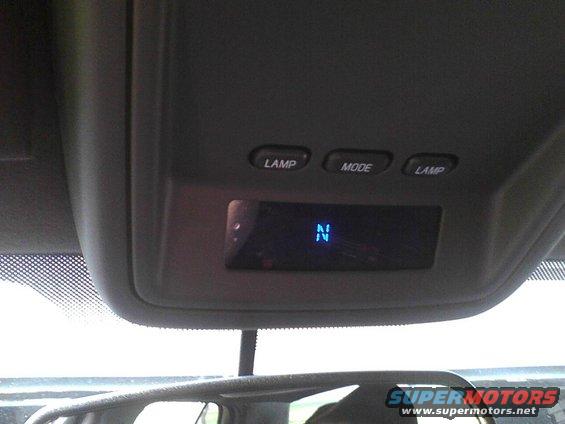 Overhead console with buttons labeled LAMP and MODE, and a digital display showing 'N'