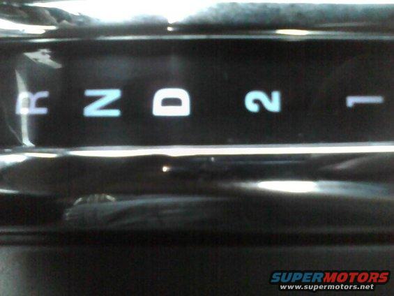 Gear shifter display showing R, N, D, 2, 1