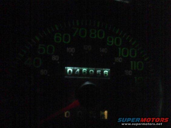 Speedometer and odometer showing 46956 miles