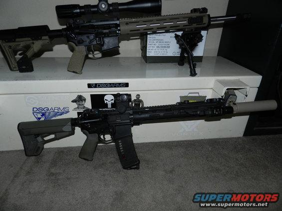 Two rifles with scopes and bipods on a white surface