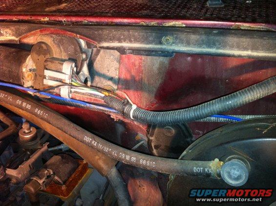 Brake Booster Vacuum/ Wiper motor harness/ A/C line to compressor below brake booster VAC.