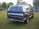 1993 Ford Bronco - Rear view of a 1992 Ford Bronco with a two-tone paint scheme.