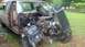 1983 Ford F-250 - This heavily damaged pickup truck shows its engine and radiator after a significant front-end collision.