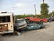 1986 Ford Bronco - A chaotic scene shows multiple vehicles piled up, including a bus, minivan, sedan, and a lifted pickup truck.