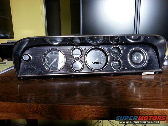 1967 Ford F-100 instrument cluster with speedometer, tachometer, and gauges