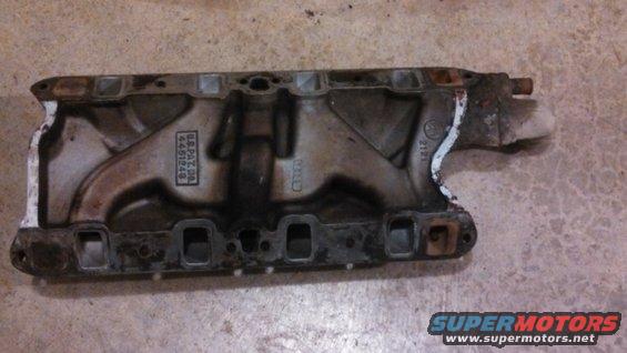 Engine intake manifold with US PAT. 4451248 stamped on it
