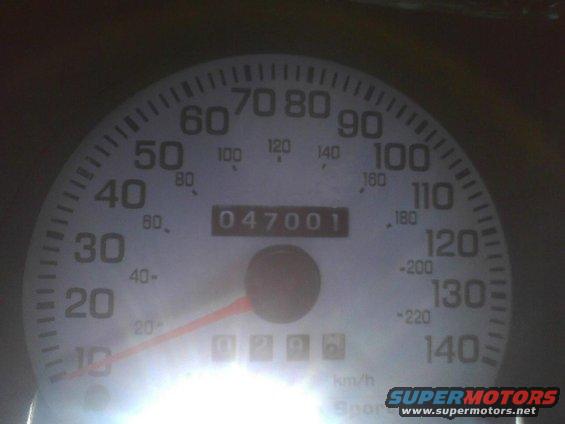 Odometer shows 047001 miles. Speedometer goes up to 140