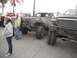 1986 Ford Bronco - Modified trucks with people in Santa hats gathered together.