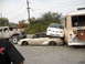 1986 Ford Bronco - A chaotic scene shows multiple vehicles involved in a collision, with cars stacked and damaged.