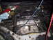 1993 Ford Probe - Engine bay with various tools and hoses visible, suggesting maintenance work.