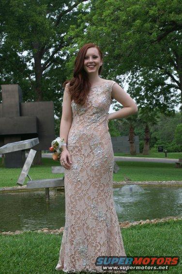 Woman in a formal dress with a corsage