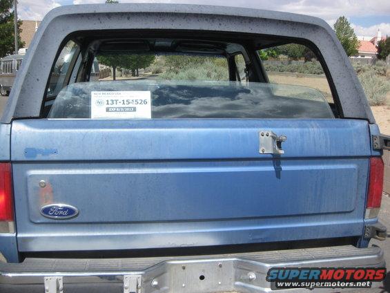 Blue Ford Bronco with a New Mexico license plate expiring 6/3/2013