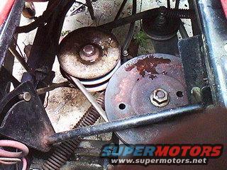 Close-up of drive belt and pulleys on a mower deck