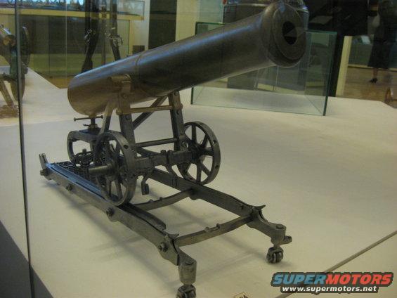 Cannon on a wheeled carriage with a brass barrel
